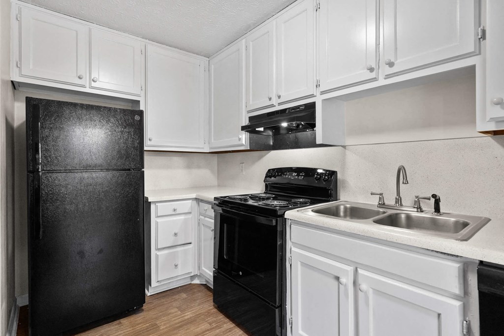 a kitchen with white cabinets at Alcovy Terrace, Georgia, 30014