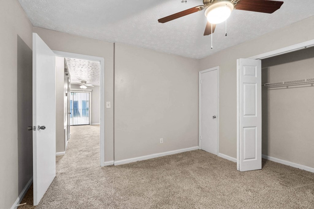 a bedroom with a ceiling fan at Alcovy Terrace, Covington, GA
