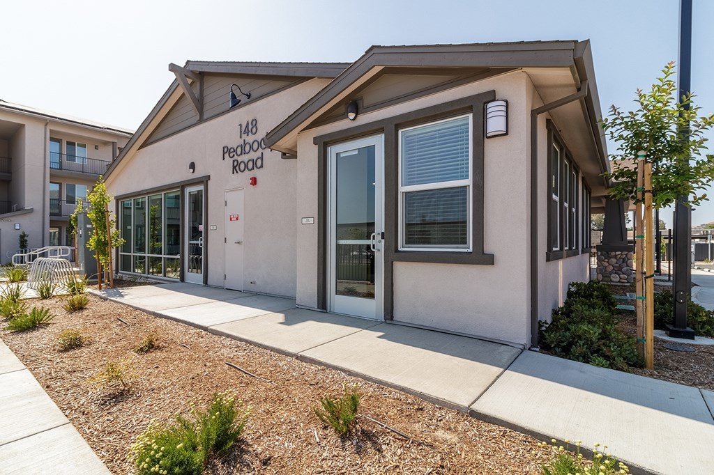 A small building with the number 148 on it.