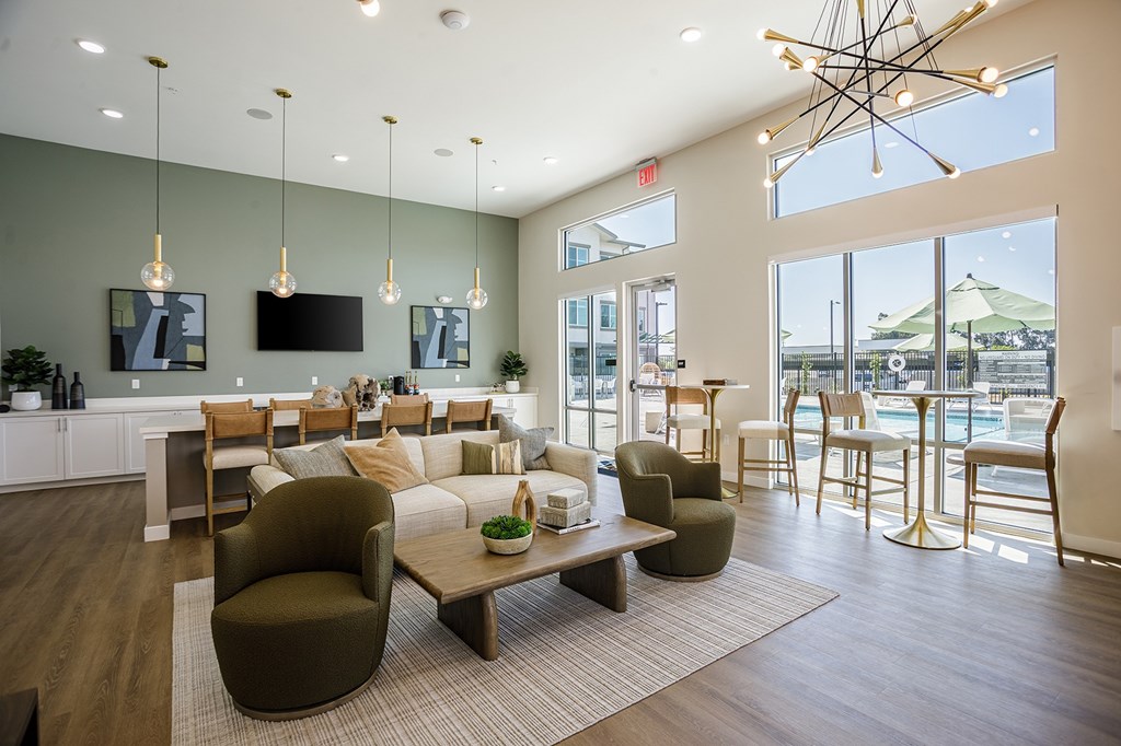 Interior of the lobby at Arrive Vacaville with a pool in the background
