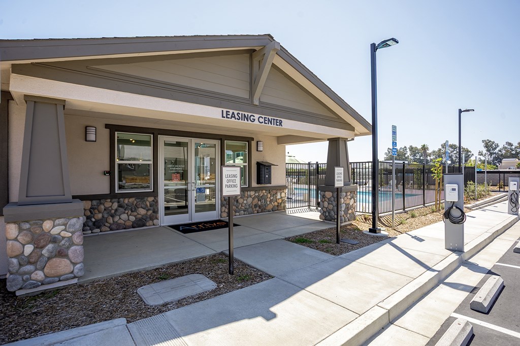 Leasing center with a stone pillar.