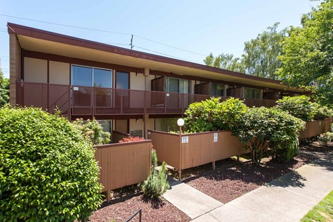 Building exterior with trees and balconies at Julie Ann, Portland, OR, Oregon