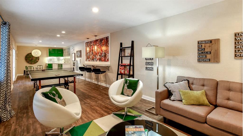 a living room with a couch and a table