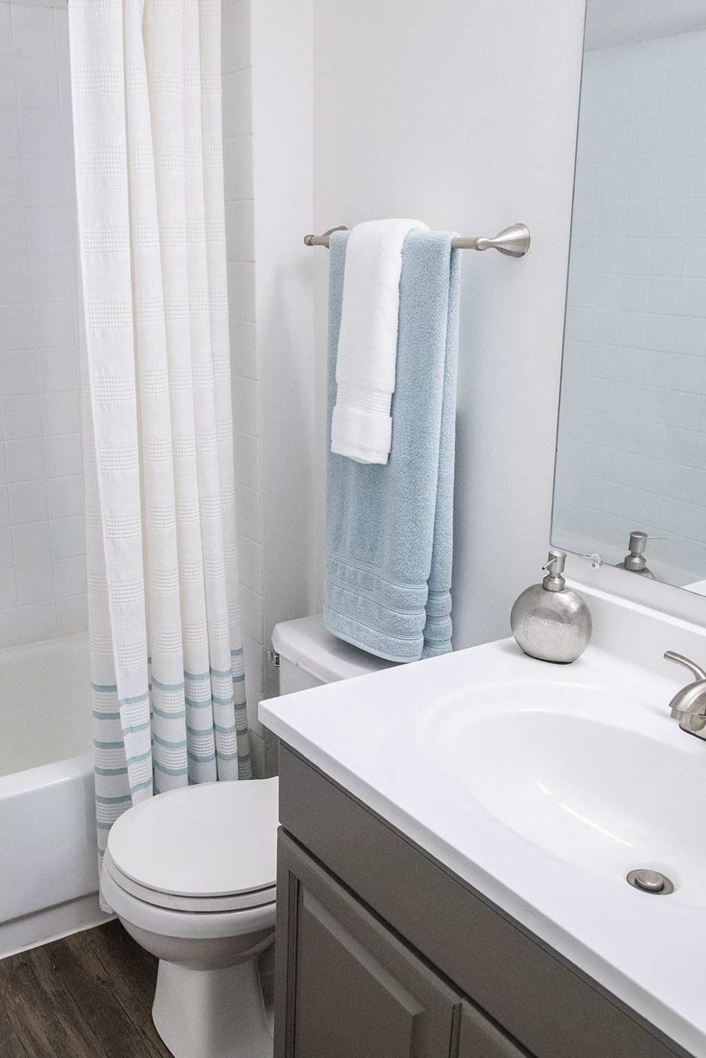 a bathroom with a sink toilet and bathtub at Fifteen 98 Naperville, Naperville, Illinois