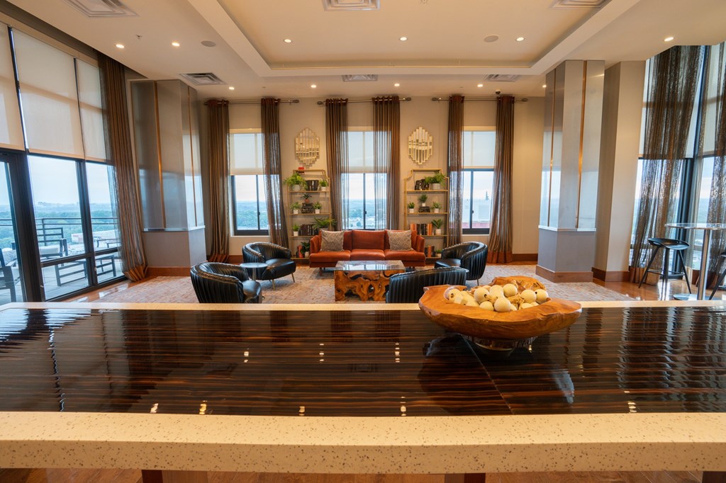 Spacious room with large windows.