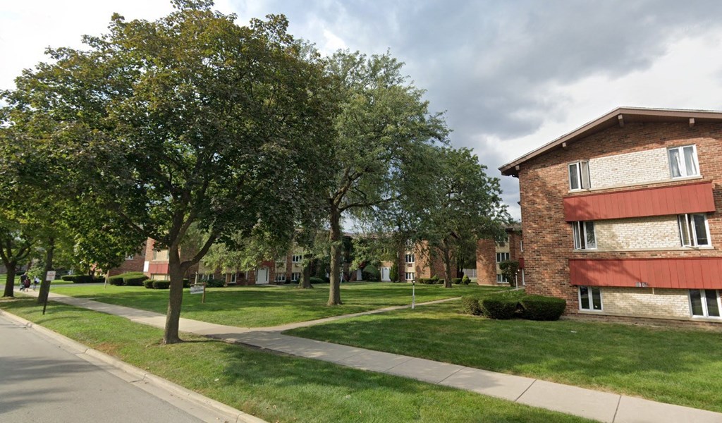 Brick building exterior with grassy areas and walkways at The Countryside, Countryside Illinois ?