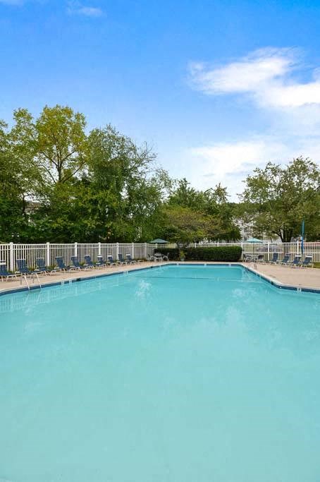 a large pool with a fence around it at ReNew Odenton, Odenton, 21113