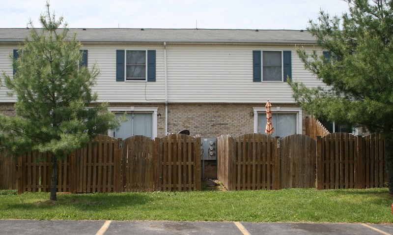 Fort Collier exterior view with fence at Fort Collier Terrace, Winchester, VA 22601