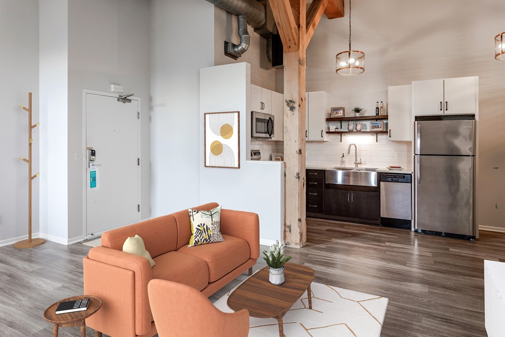 A living room with a couch and a coffee table.
