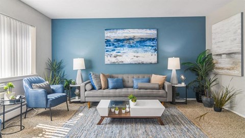 a living room with a couch and a coffee table