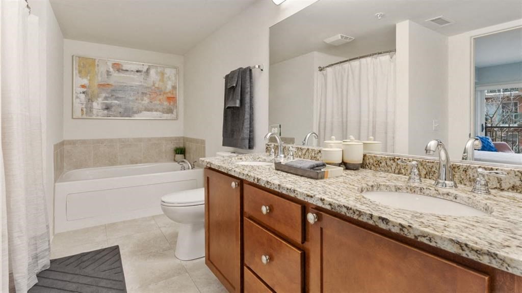 Bathroom With Bathtub at Renew Five Ninety Five, Des Plaines, Illinois