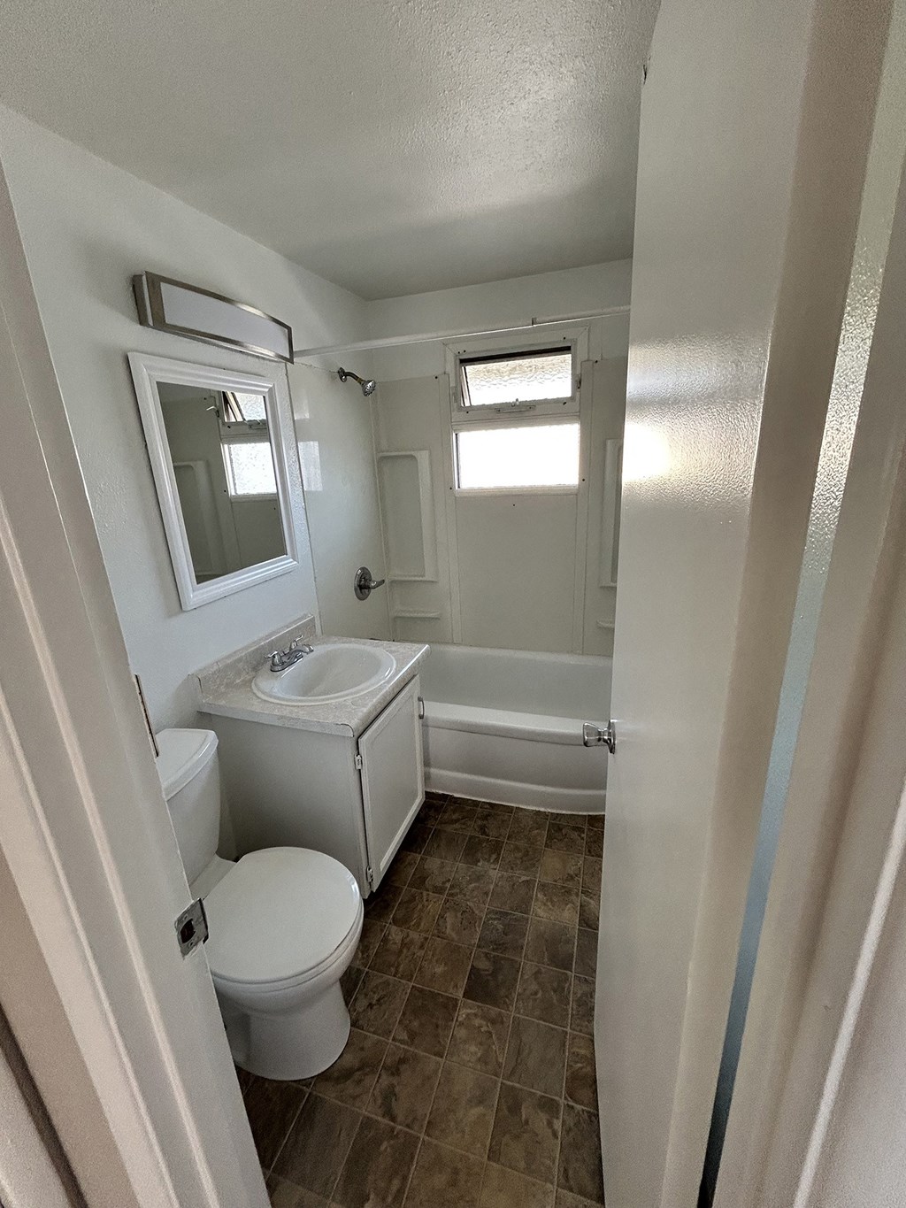 a small bathroom with a toilet and a sink