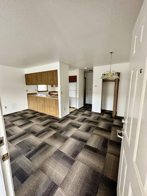 Living room with view of the kitchen