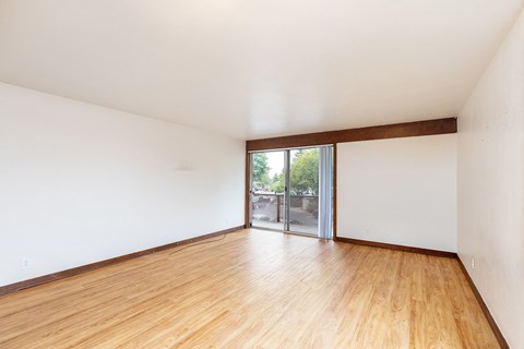 Living room with wooden floors at Julie Ann, Portland, 97215
