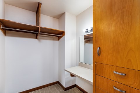 Wooden closet with a mirror and drawers at Julie Ann, Portland, OR, 97215