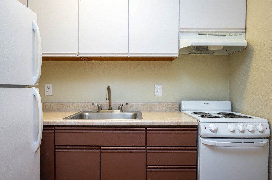 Kitchen interior view at Maurice Dear Apartments, Portland, 97205