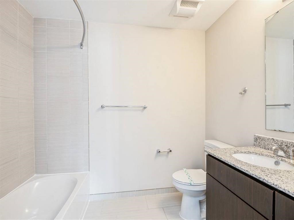 Bedroom with vanity at Arrive Wheaton, Wheaton, MD