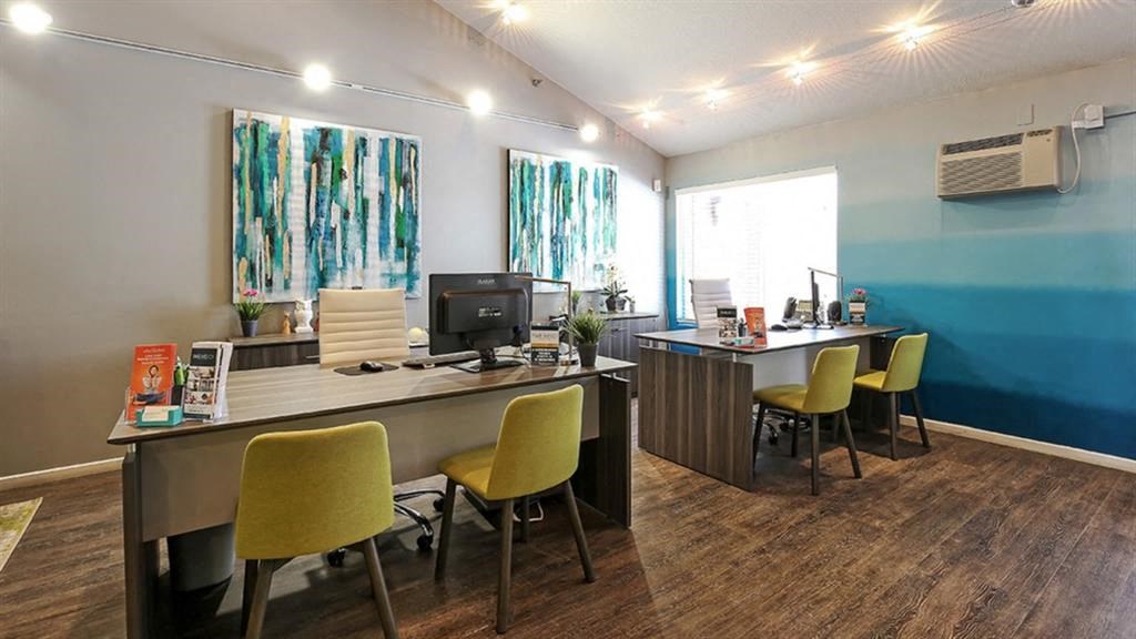 Clubhouse interior with white and blue wall colors1 at Twelve 501 Apartment Homes, Burnsville, 55337