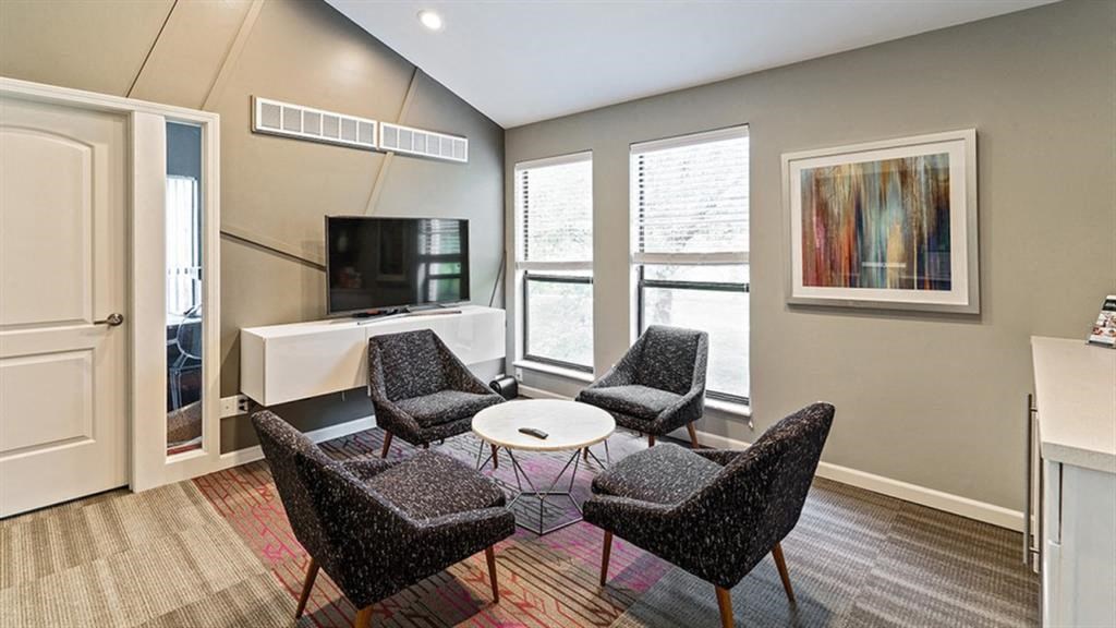 Living Area With TV at The Avalon Apartment Homes, Chesterfield, MO
