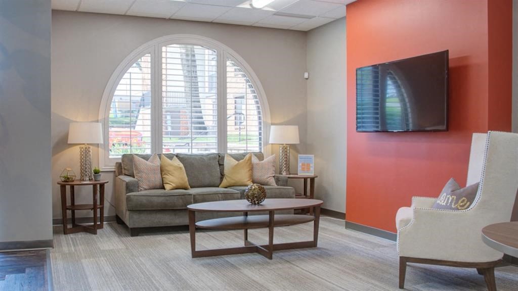 Living Room With TV at The Magnolia Apartment Homes, Chesterfield