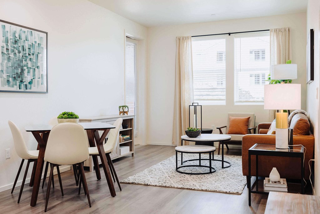 a living and dining room area with a table and chairs at Arrive Paso Robles, Paso Robles, CA