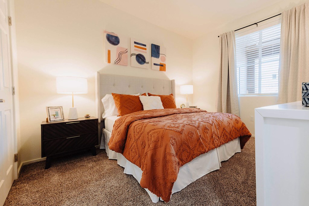 a bedroom with a bed and two nightstands  at Arrive Paso Robles, Paso Robles, CA, 93446