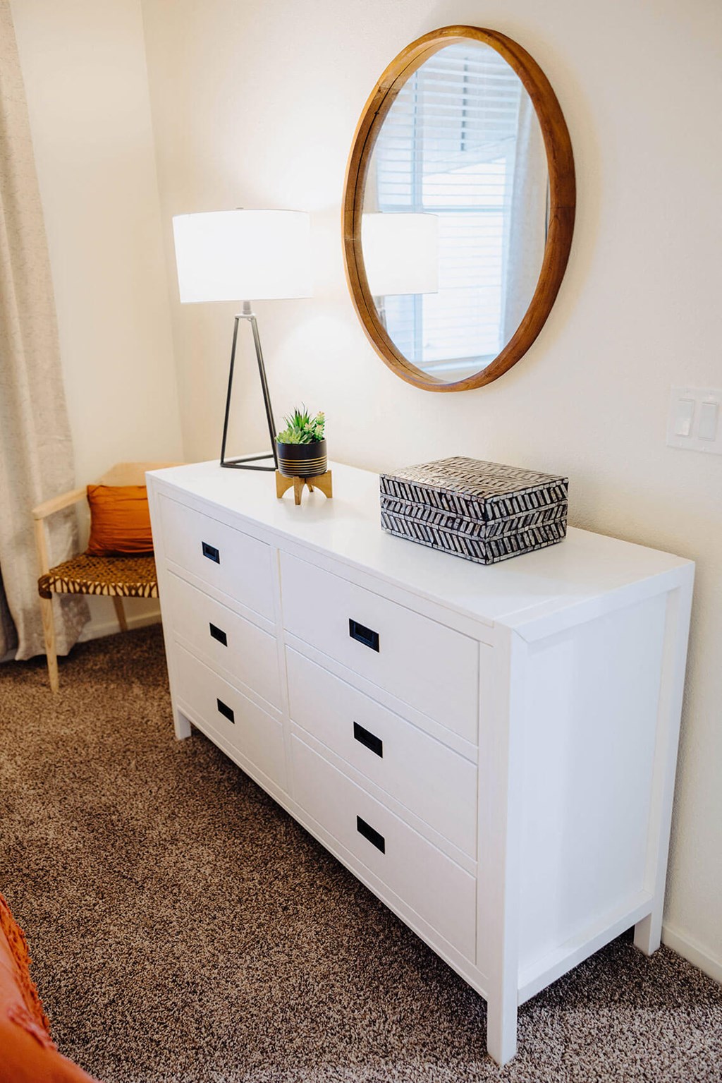 a white dresser with a round mirror above it at Arrive Paso Robles, Paso Robles, 93446