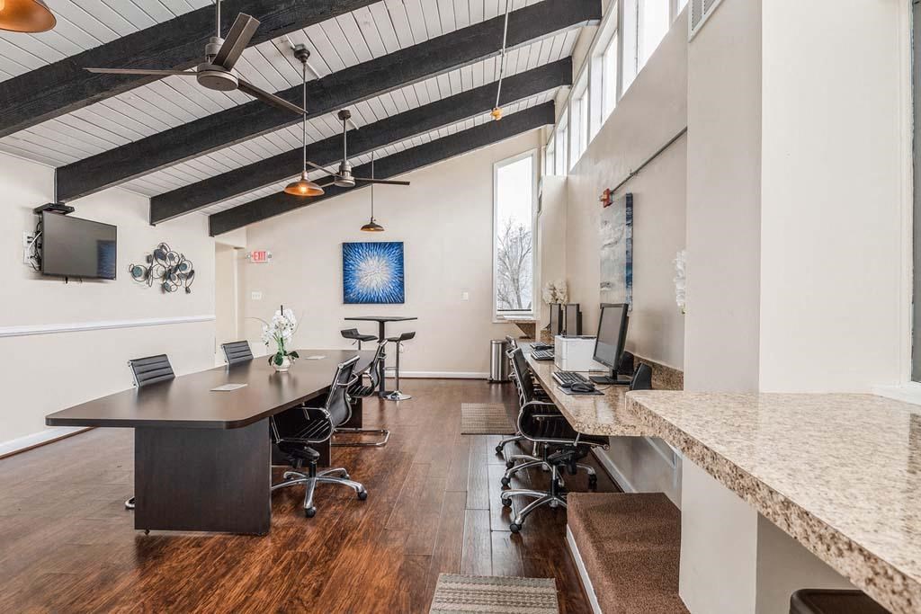 a large room with a long table and chairs at ReNew Odenton, Maryland, 21113