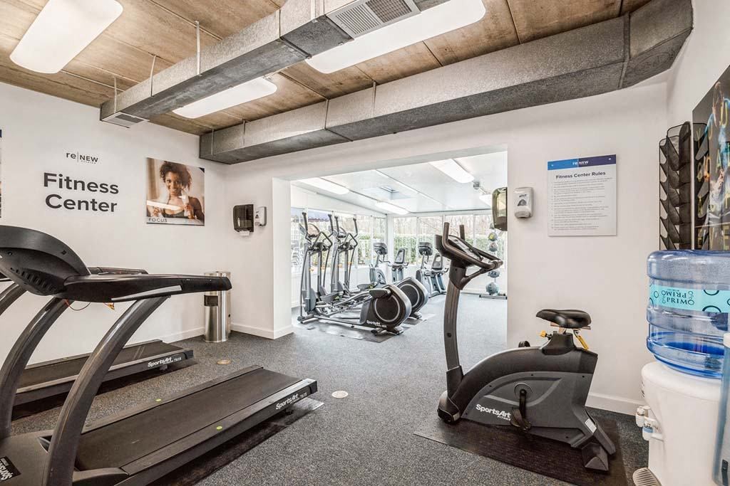 a gym with treadmills and other exercise equipment at ReNew Odenton, Odenton, 21113