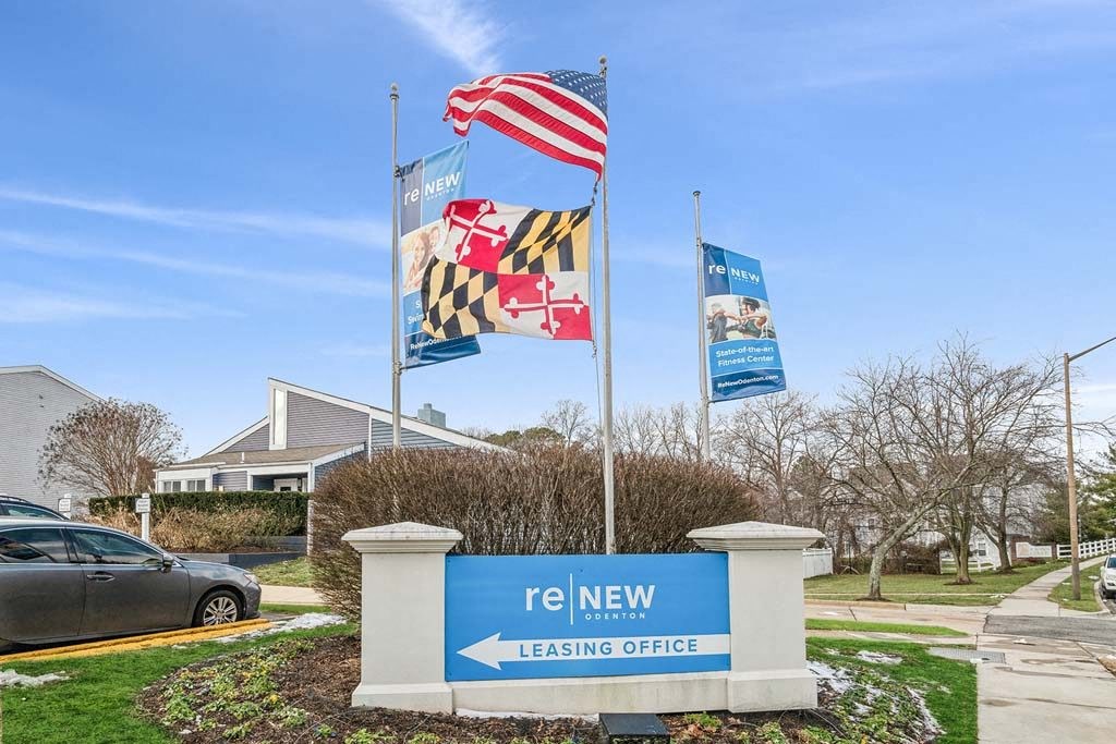 a sign in front of a house that says leasing office at ReNew Odenton, Maryland