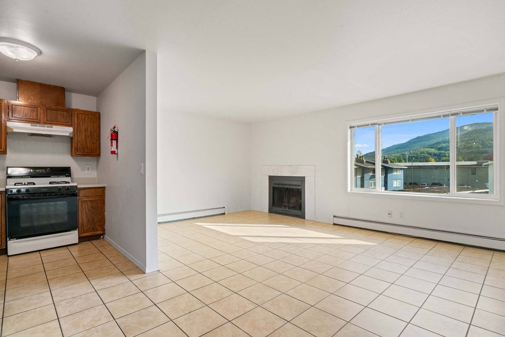 a living room along with kitchen at ReNew Eagle River, Eagle River, AK