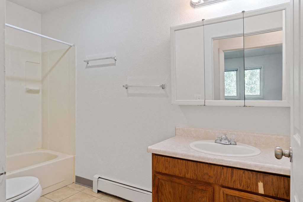 a bathroom with a sink toilet and shower at ReNew Eagle River, Eagle River, Alaska
