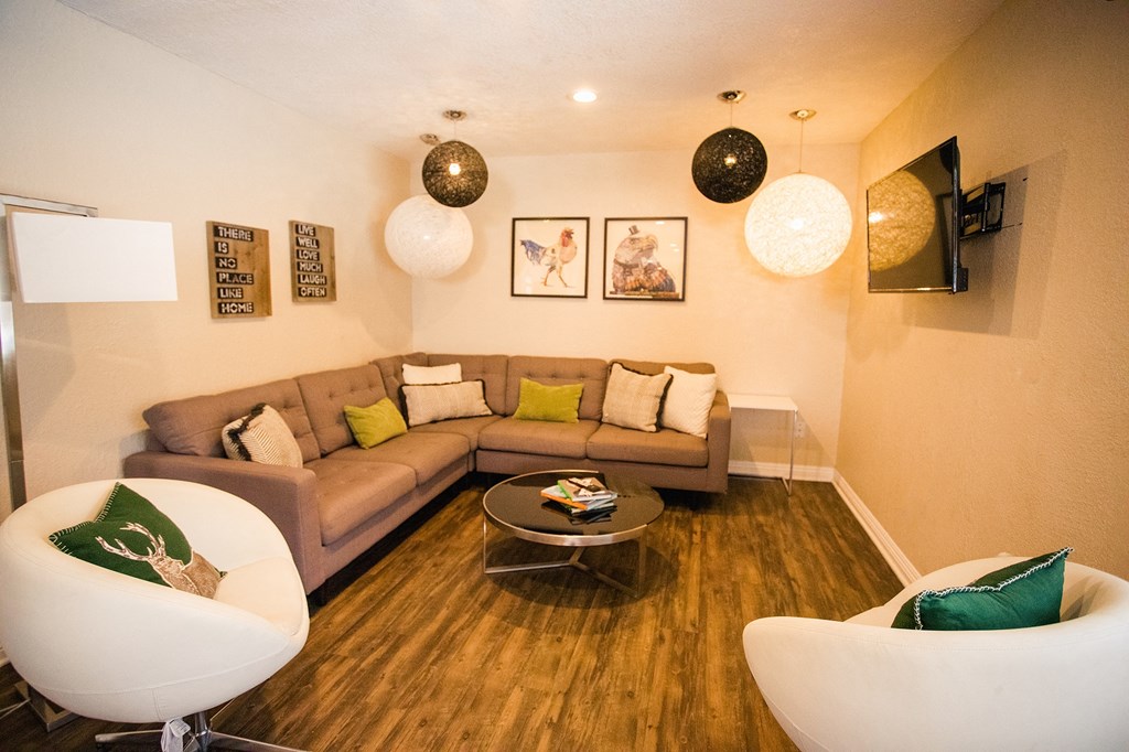 a living room with a couch and a table