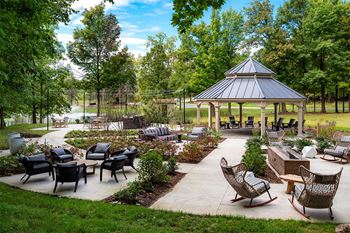 a patio with chairs and a gazebo in a park  at Ascent at Farmington Hills, Farmington Hills, MI, 48331