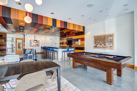 Resident lounge with billiards table at Track 29 Apartments, Minneapolis, MN, 55408