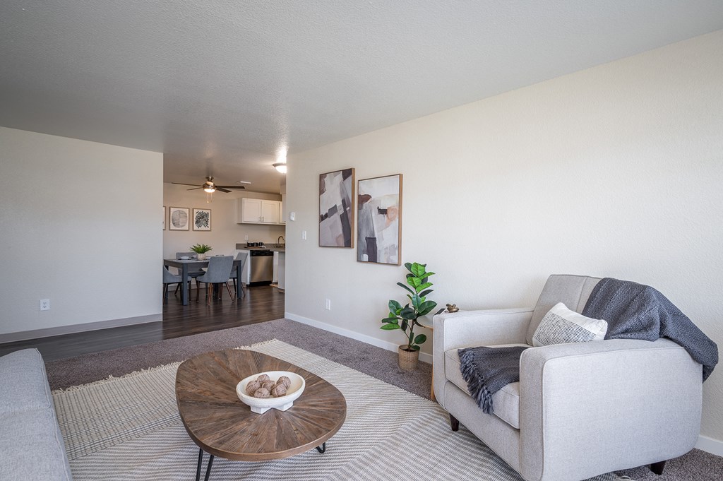 a living room with a couch and a coffee table at Sundial Apartments, Wilsonville, 97070