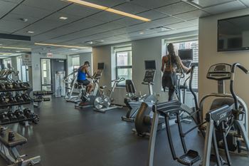 a group of people working out in a gym