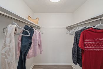 a closet with a rack of clothes and a shoe on the ceiling at Williamsburg South, Pittsburgh, 15228