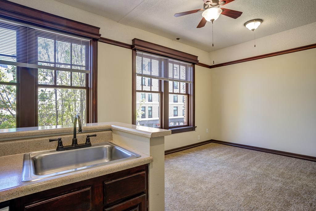 a kitchen with a sink and windows at Whitney Gray, Portland Oregon ?