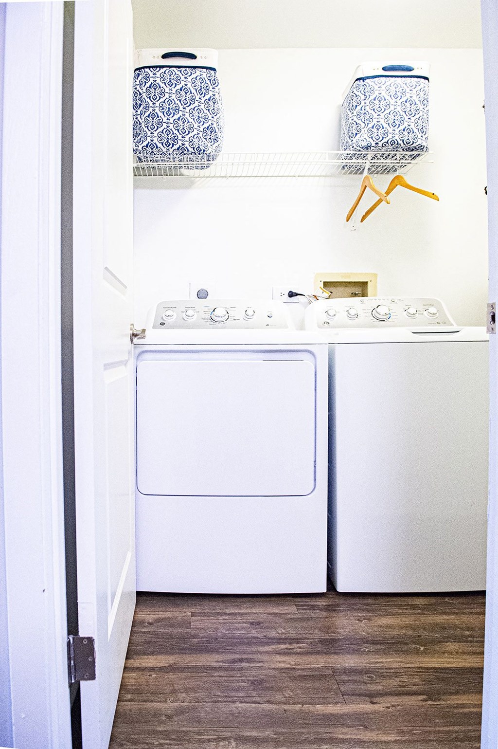 a small laundry room with a washer and dryer at Fifteen 98 Naperville, Naperville, Illinois