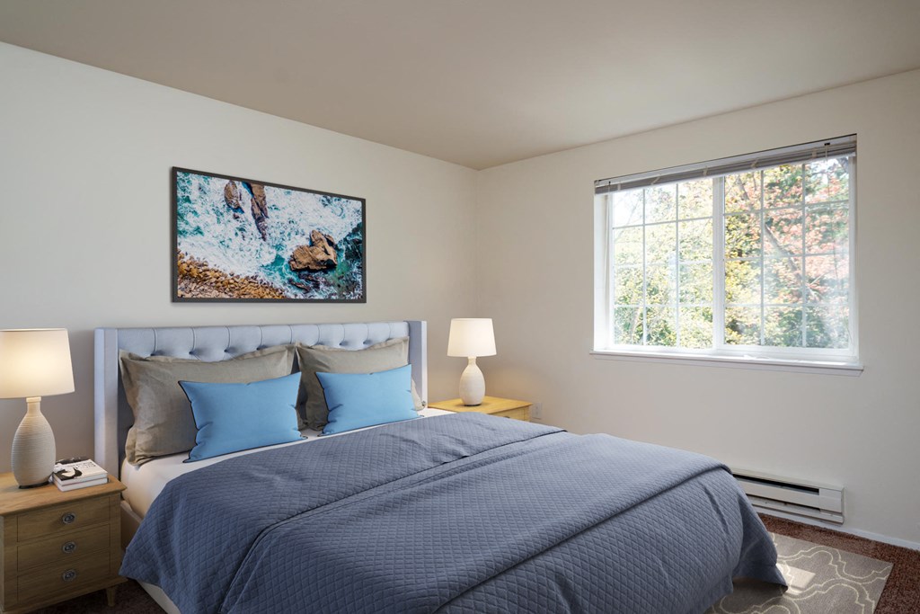 a bedroom with a bed and a window at Sundial Apartments, Oregon