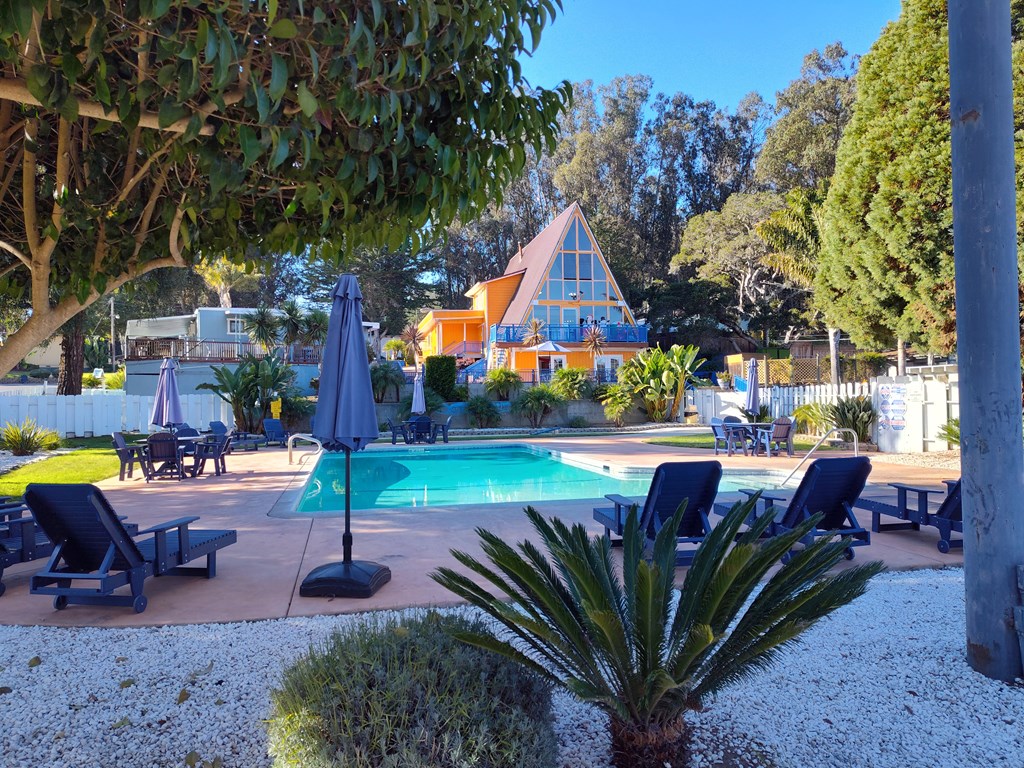 View of the pool and cabin at Salinas Sunset Apartments, Salinas, CA