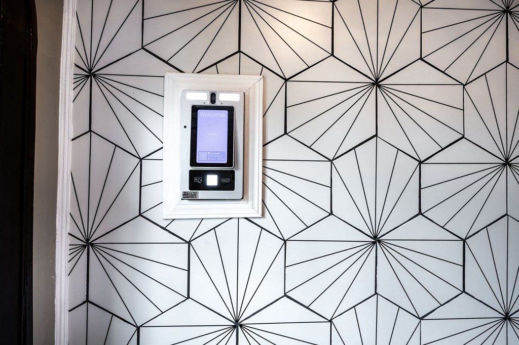 door lock on patterned wallpaper at Evelyn Apartments, Oak Park