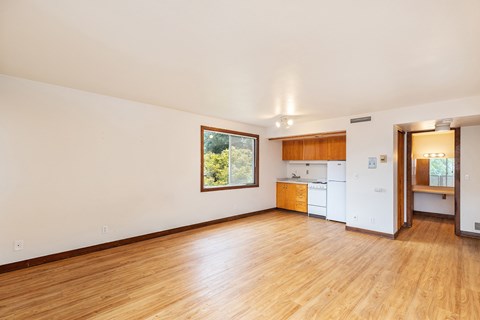 Living room with wooden floors and a window at Julie Ann, Portland, OR, Oregon , 97215
