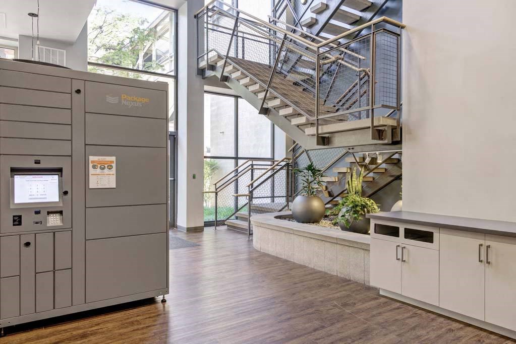 a room with a staircase and a counter at Flats at Southside, Pennsylvania