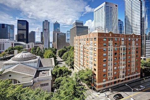 A cityscape with a mix of modern and older buildings. at The Exeter Apartments, Seattle, WA, 98101