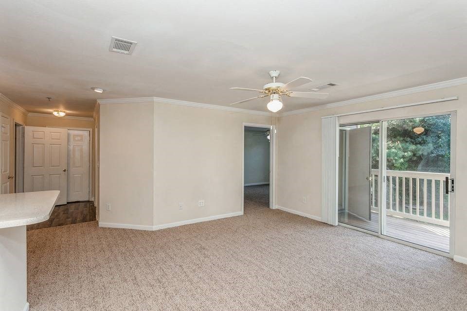 Carpeted Living Area at ReNew Sugar Hill, Sugar Hill, Georgia