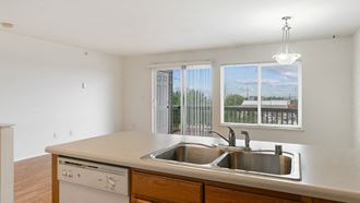 Sink With Faucet at ReNew Bayshore Townhomes, Anchorage, AK, 99515