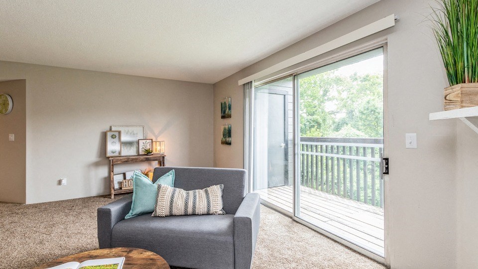 Living Room With Balcony at ReNew Cross Creek, St. Louis, MO, 63125