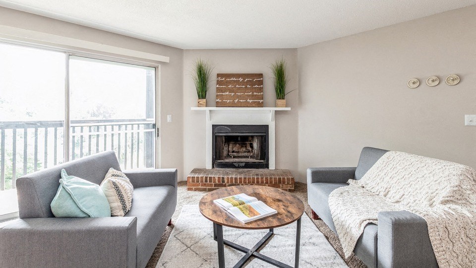 Living Room With Fireplace at ReNew Cross Creek, St. Louis, Missouri